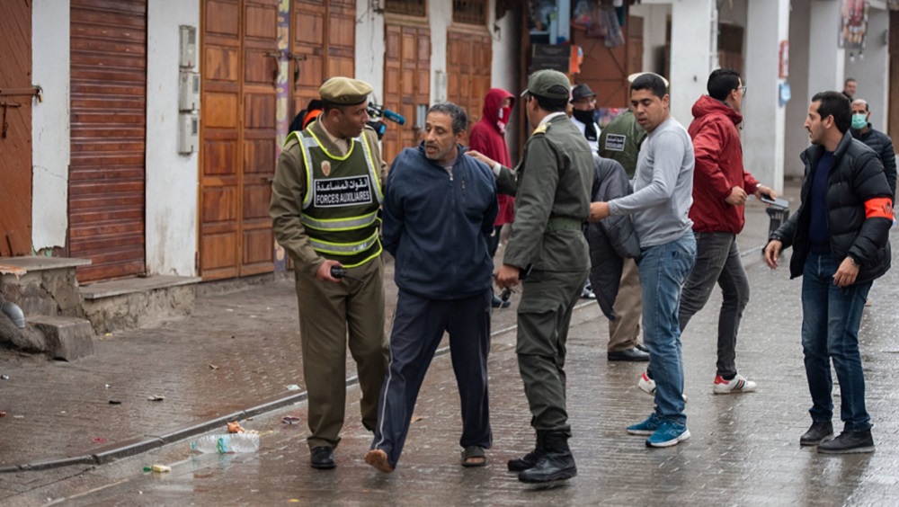 Security forces order to stay home to people after state of emergency declaration as a precaution against coronavirus (COVID-19) in Rabat, Morocco 20 March 2020 (Anadolu Agency)