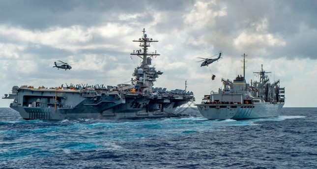 US aircraft carrier USS Abraham Lincoln in the Arabian Sea, 7 June (Reuters)