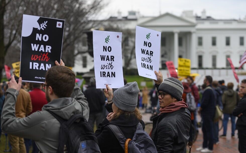 Anti-war activists protest in front of the White House in Washington, DC, on January 4, 2020 (AFP)