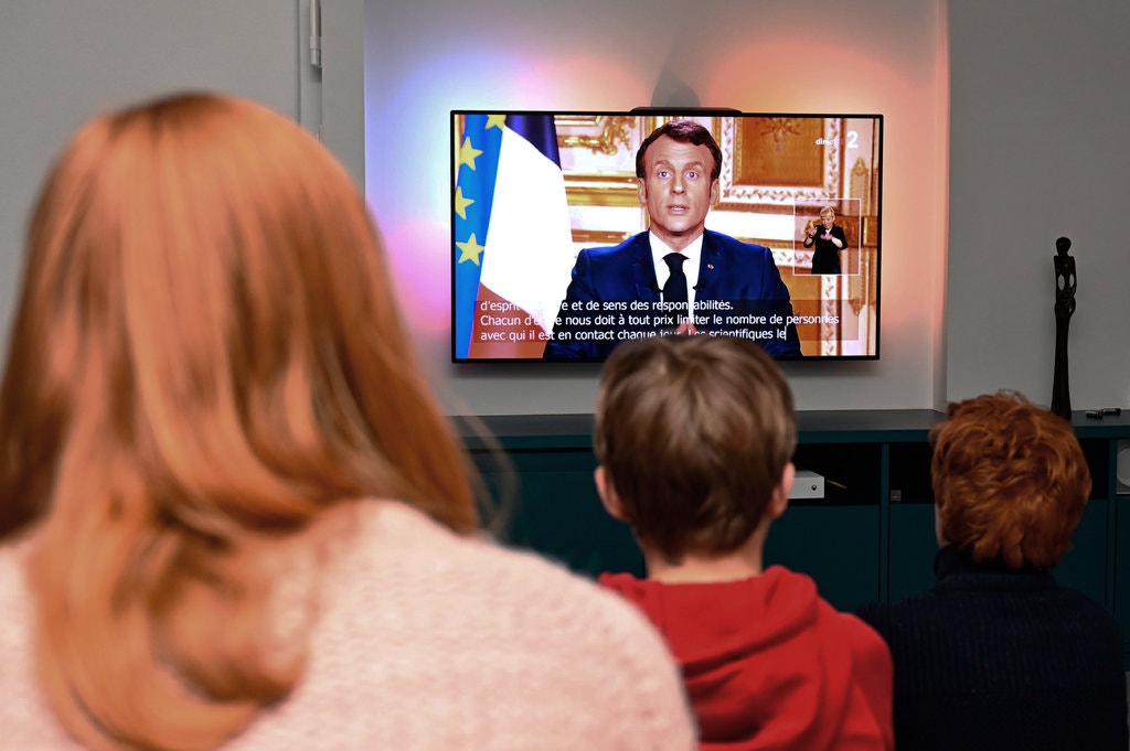 Watching President Emmanuel Macron’s address to the nation [Getty]