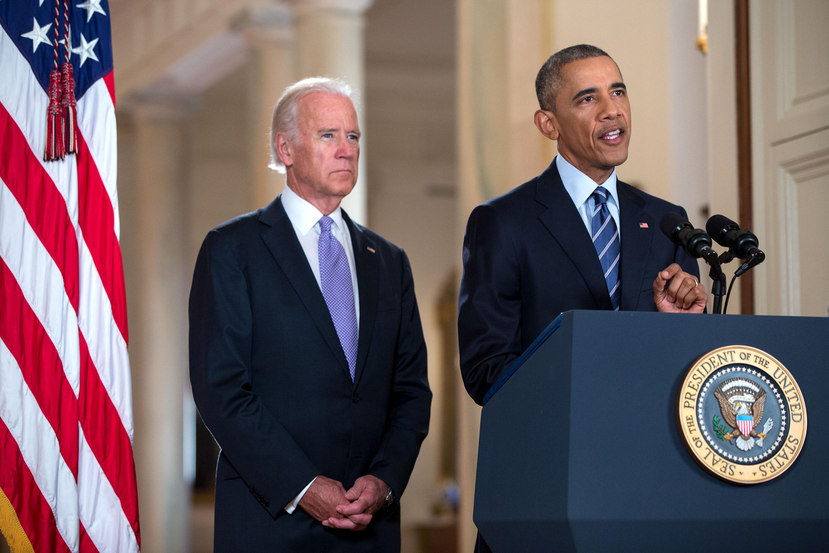 Former U.S. President Barack Obama flanked by Vice President Joe Biden delivers a statement on the Iran nuclear agreement in the East Room of the White House on July 14 2015 (White House)